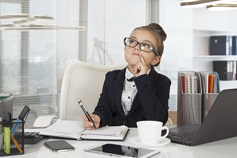 Child sitting at a desk